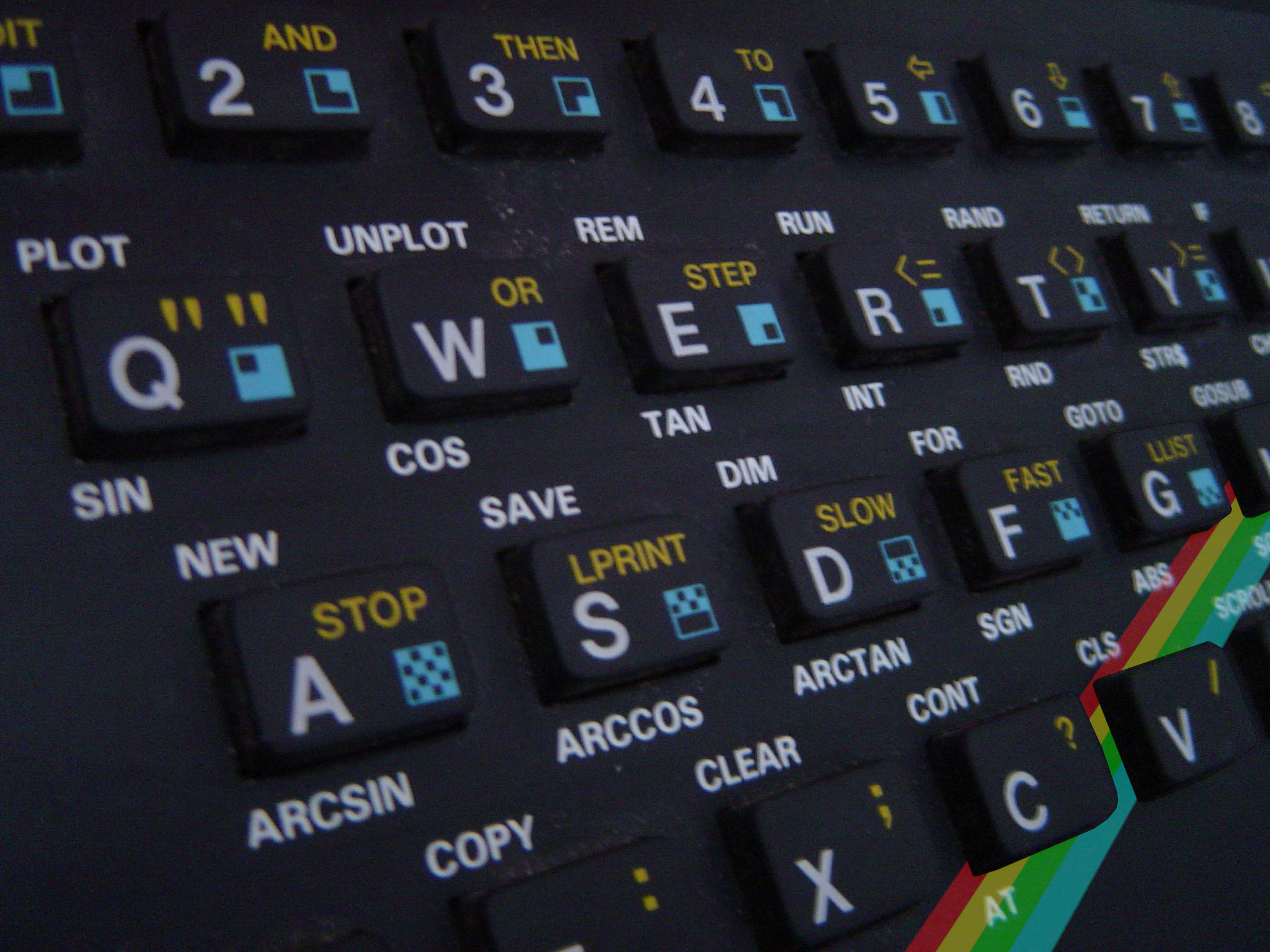 Picture of Spectrum keyboard featuring BASIC tokens on each key.